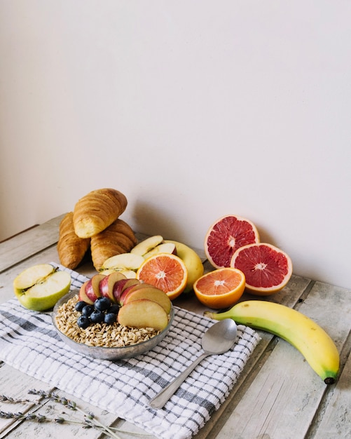 Table with cereal and fruits