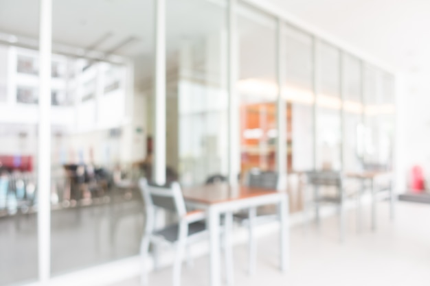 Tables with gray chairs unfocused abroad