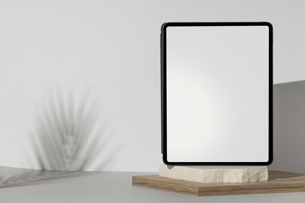 Tablet minimal display on rock