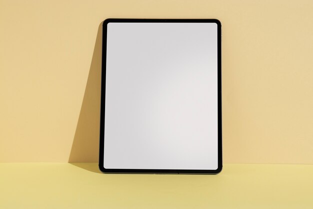 Tablet minimal display with yellow background