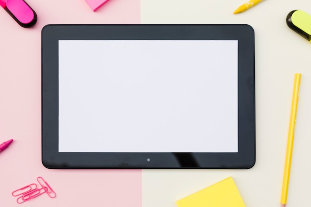 Free photo tablet with cute stationery