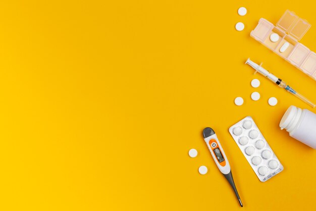 Tablets with pills on desk