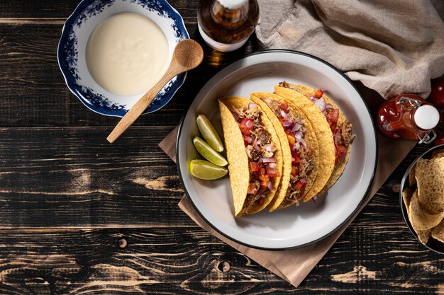 Tacos with vegetables and meat above view