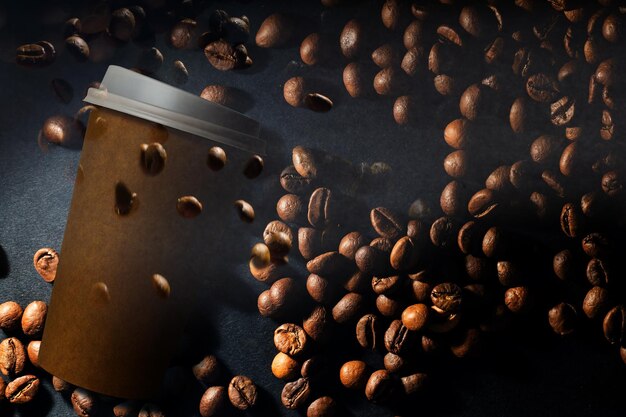 Takeaway cup with coffee and coffee beans