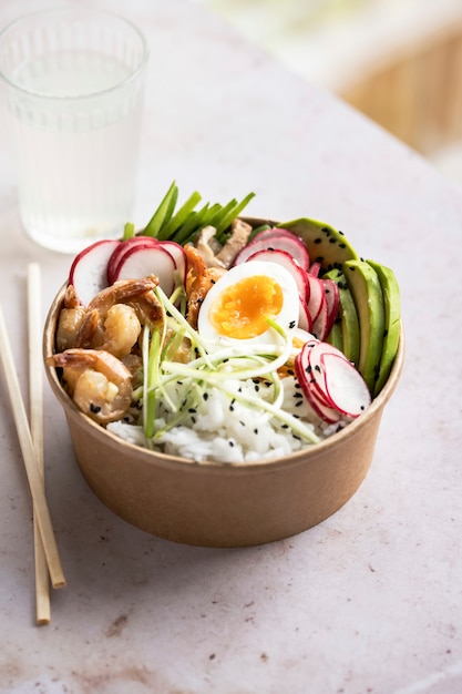 Takeaway egg and prawn poke bowl