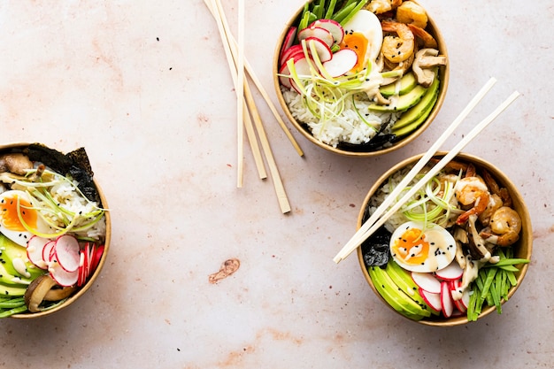 Takeaway egg and prawn poke bowls