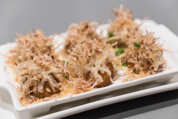 takoyaki on white plate