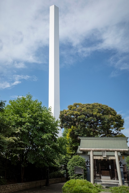 Tall chimney surrounded by nature