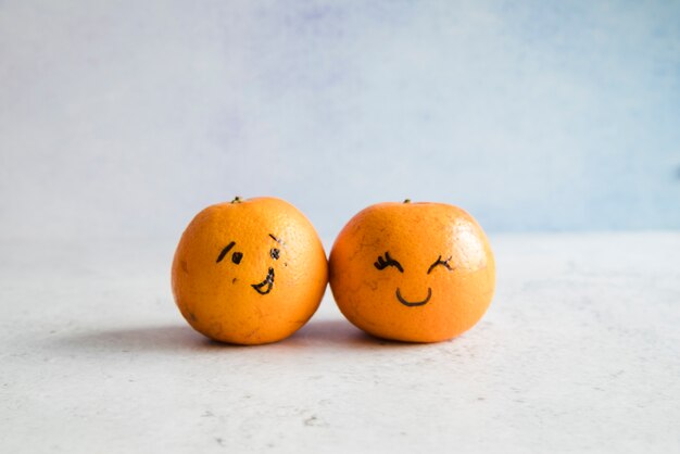 Tangerines with funny faces
