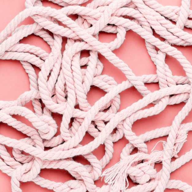 Free photo tangled pink ship rope for commercial fishing