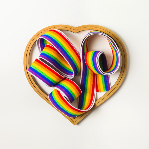 Tape in LGBT colors among heart symbol