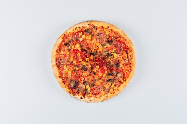 Tasteful pizza on a white background. flat lay.