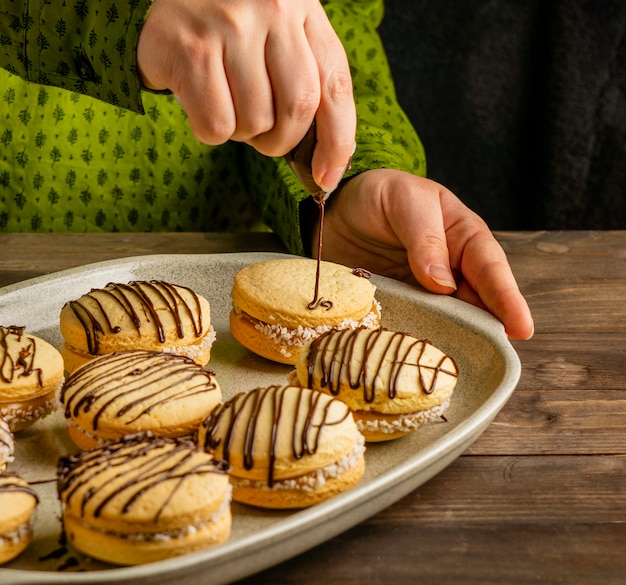 Tasty biscuits with chocolate cream