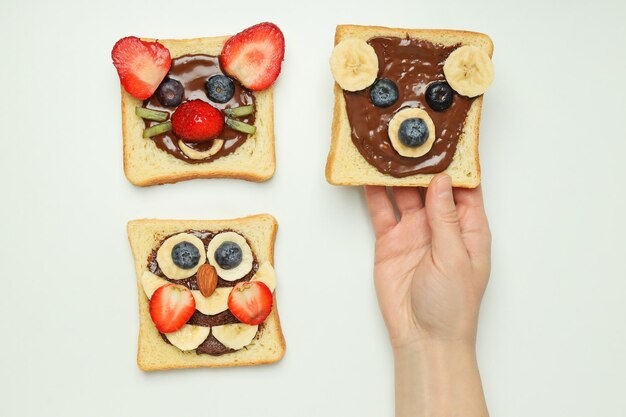 Tasty breakfast for kid toasts top view