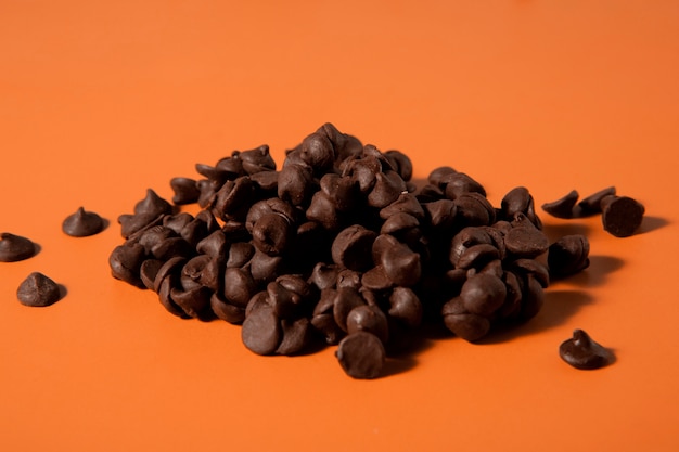 Tasty chocolate chips still life high angle