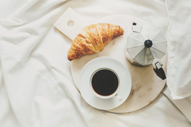 Tasty classic breakfast served in bed