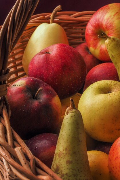 Tasty colorful pears and apples