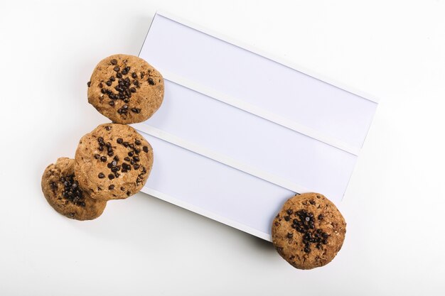 Tasty cookies on white board