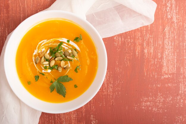 Tasty cream soup with seeds and  parsley