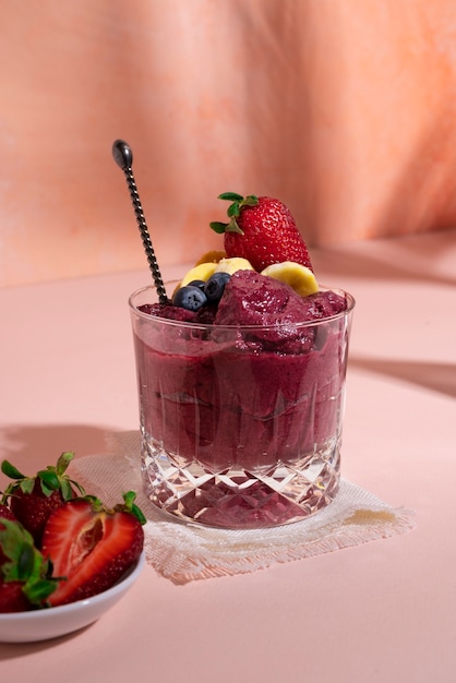 Free photo tasty cup of açai dessert with fruits