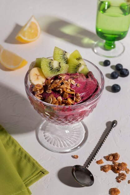 tasty cup of brazilian dessert with kiwi