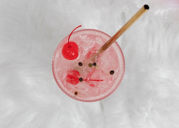 Tasty daiquiri cocktail with cherry flat lay