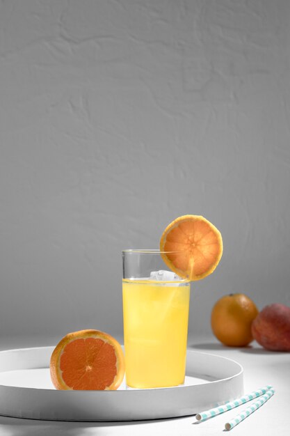 Tasty detox drink with orange slices