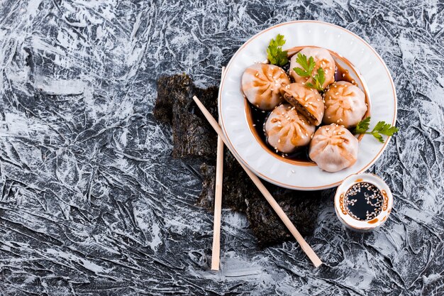 Tasty dumplings plate top view