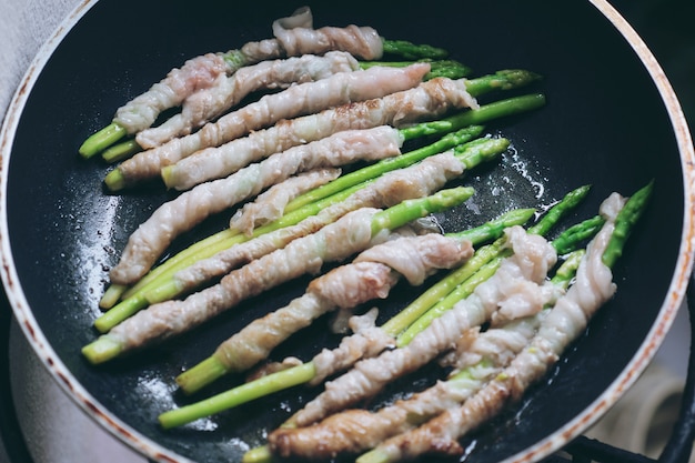 Grilled asparagus on grill pan Photo | Free Download