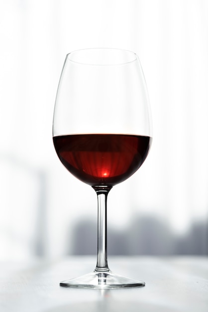Tasty glass of red wine close-up