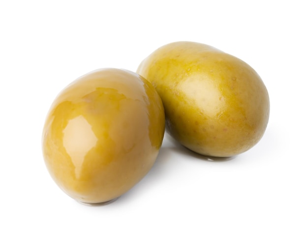 Tasty green olives isolated on white background