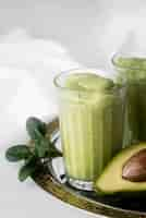 Free photo tasty green smoothie with avocado