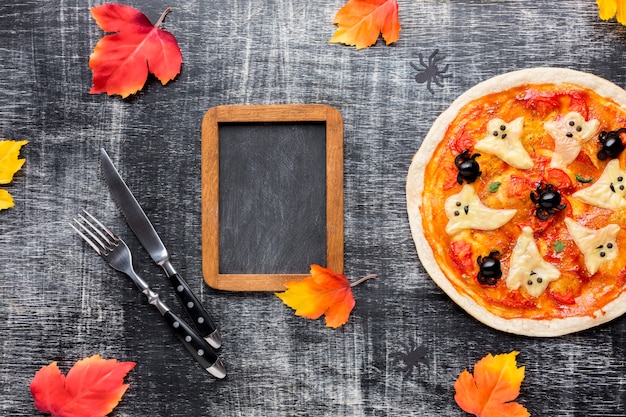 Tasty halloween pizza with mock-up frame