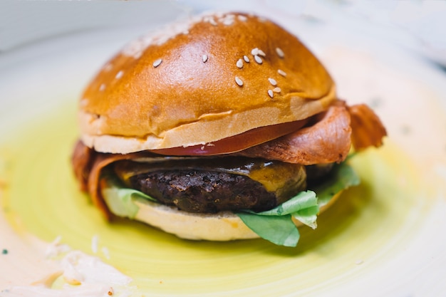 Tasty hamburger on olive oil