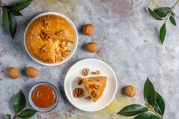 Free photo tasty homemade soviet traditional anthill cake with walnut,condensed milk and cookies