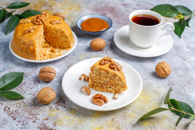 Tasty homemade Soviet traditional Anthill cake with walnut,condensed milk and cookies