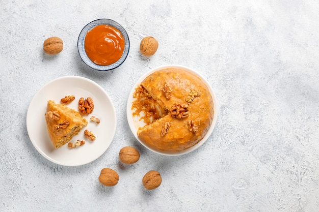 Free photo tasty homemade soviet traditional anthill cake with walnut,condensed milk and cookies