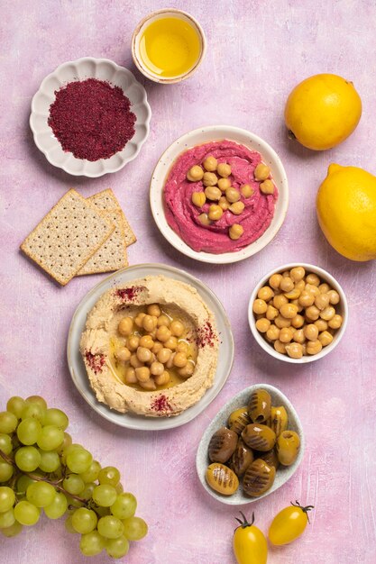 Tasty hummus on plate above view