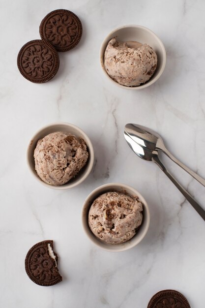 Tasty ice cream and cookies top view