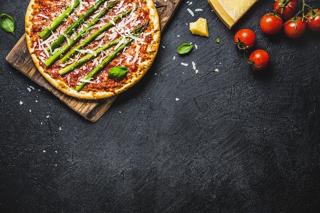 Tasty italian pizza with tomato sauce and parmesan