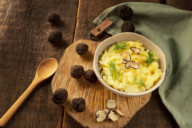 Tasty mashed potatoes with truffle high angle