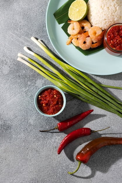 Free photo tasty meal with sambal arrangement