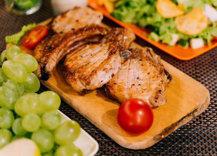 Free Photo tasty meat and salad top view