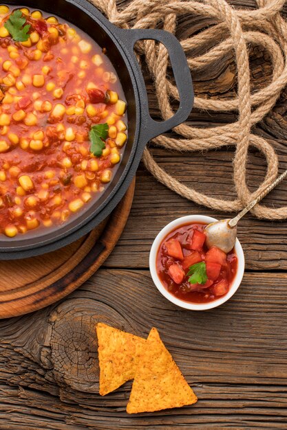 Tasty mexican food with nachos and dip