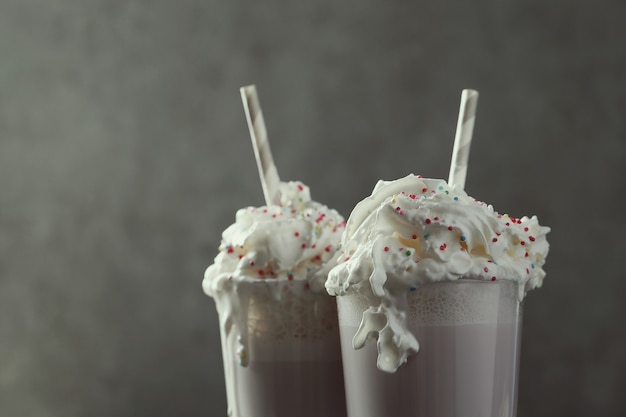 Tasty milkshake drink with straw