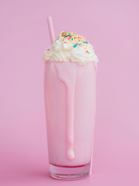 Tasty milkshake in transparent glass