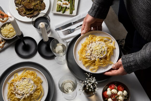 Tasty pasta on plate top view