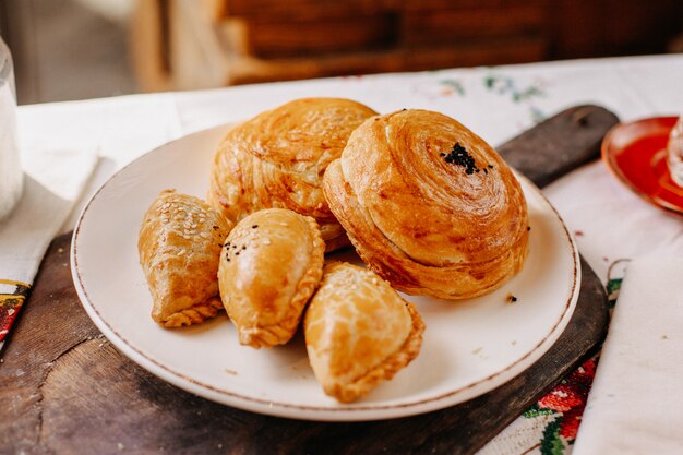 tasty pastries qoghal meat pastries inside white plate