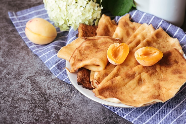 Бесплатный Фотография вкусное персиковое и блиновое оформление