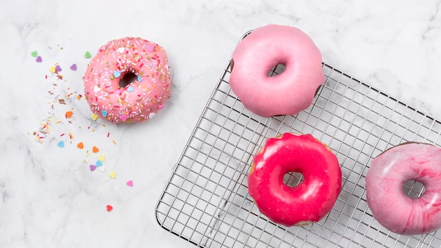 Tasty pink glazed donuts